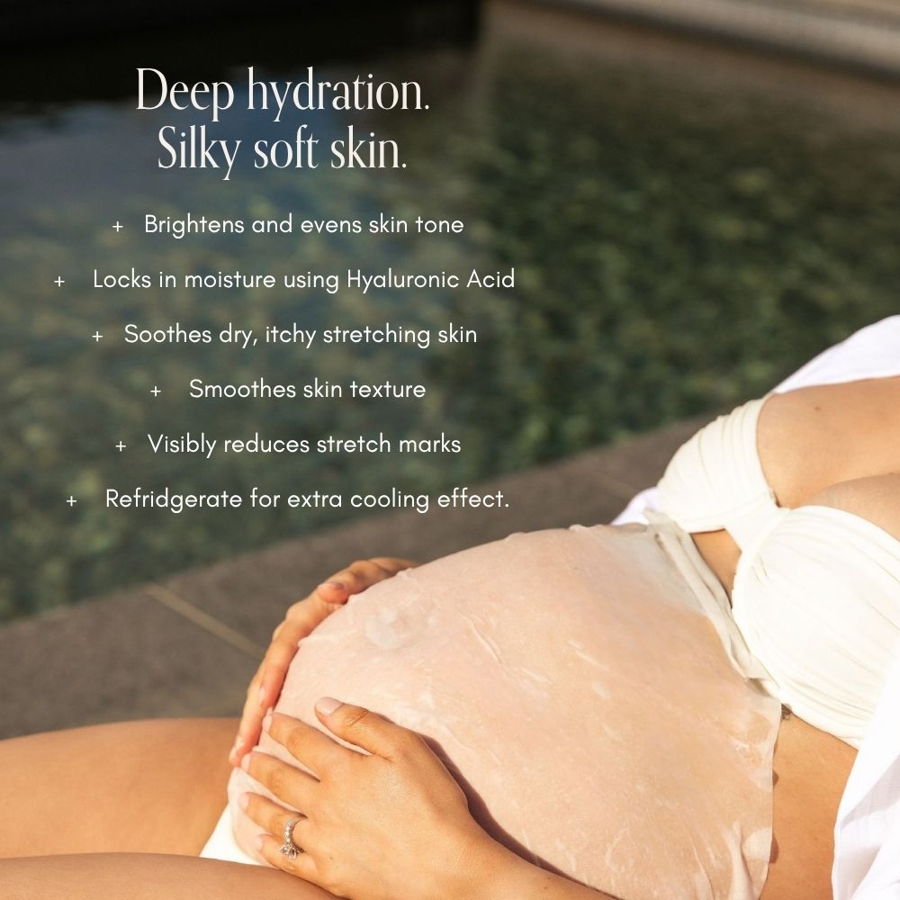 A pregnant woman in a white bikini relaxes by the pool, caressing her belly treated with Pure Mama NZ’s Belly Hydration Mask. On-image text highlights deep hydration, brighter skin tone, and reduced stretch marks.