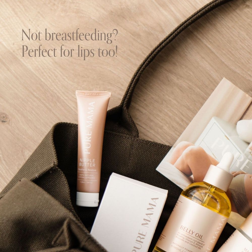 A flat lay of Pure Mama NZ Nipple Butter in a tote bag on wood. Text: “Not breastfeeding? Perfect for lips too!”.