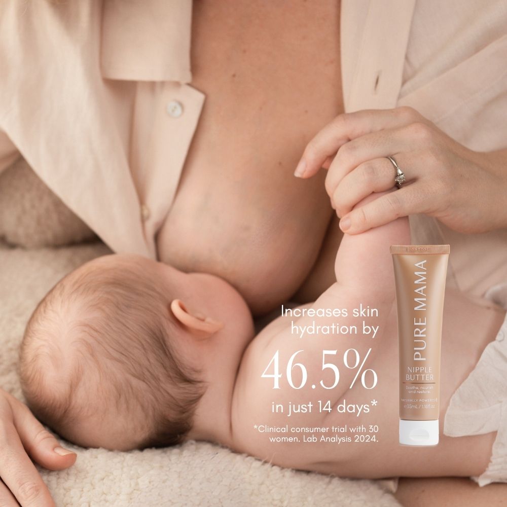 A mother breastfeeds her baby while holding a tube of Pure Mama NZ Nipple Butter. Text on the image notes that a clinical study showed the product boosts skin hydration by 46.5% in 14 days.