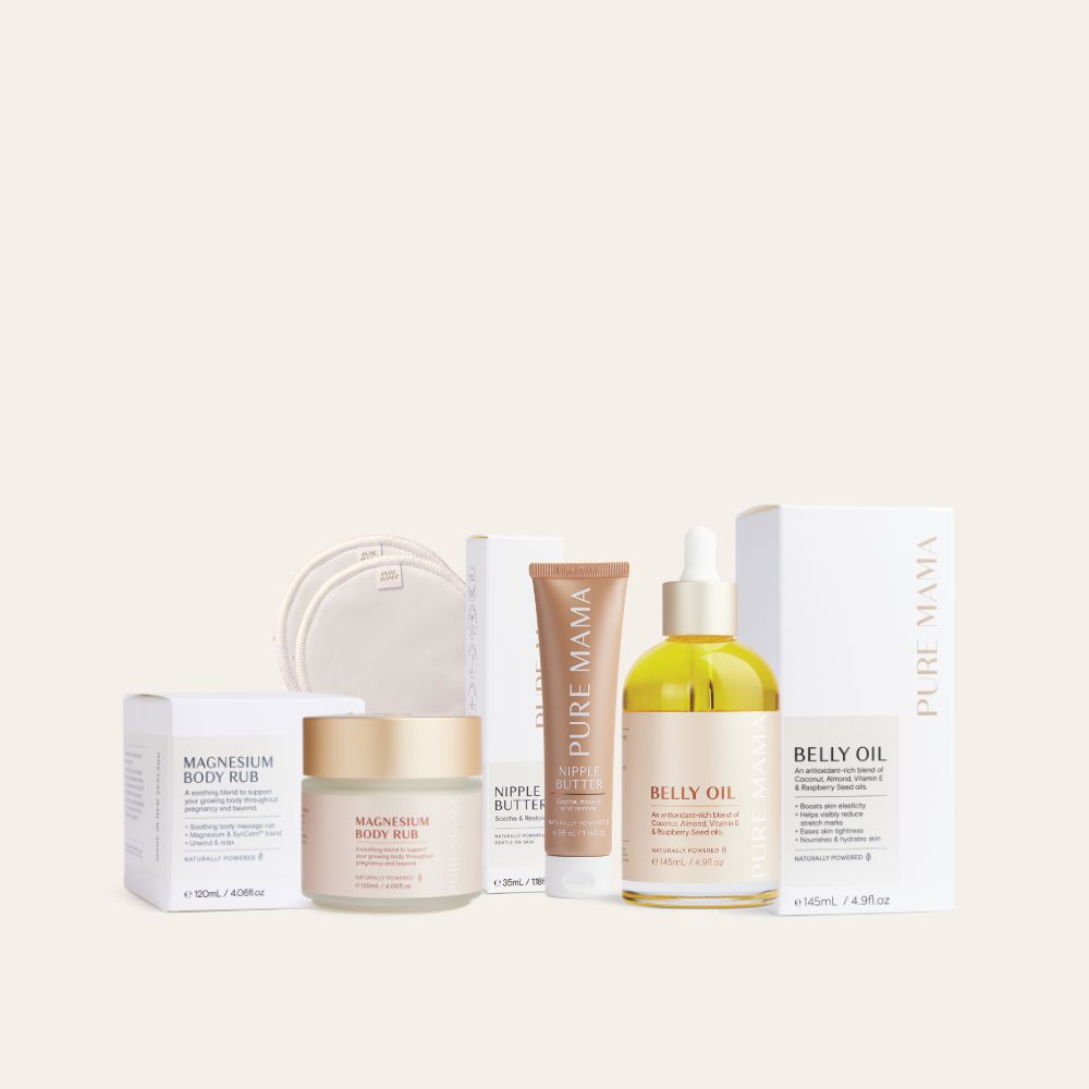 Pure Mama NZs The Essentials Set includes nourishing belly oil, magnesium body rub, nipple butter, and reusable pads, all in minimalist packaging with neutral tones.