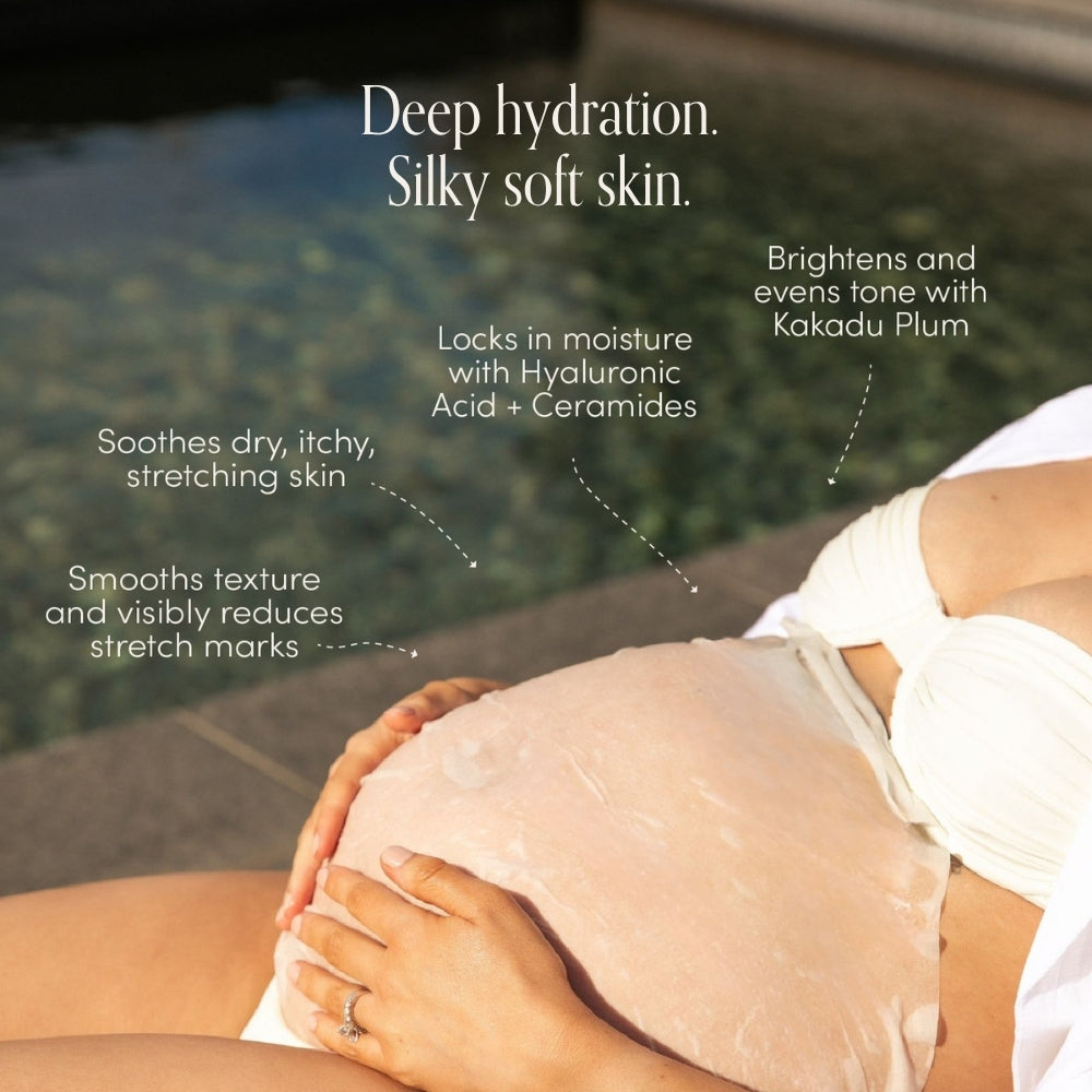 A pregnant person in a white bikini sits by a pool, holding their belly. Text highlights Pure Mama NZs Belly Spa Kit for deep hydration, stretch mark reduction, and nourishing ingredients like hyaluronic acid and Kakadu plum.