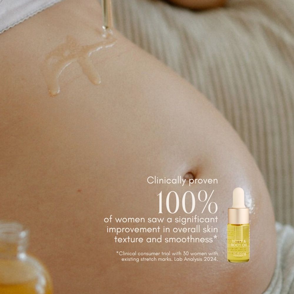 A close-up of a pregnant belly with oil applied in a swirl, beside a Belly Oil Mini dropper bottle by Pure Mama NZ. Text: Clinically proven—100% of women saw significant improvement in skin texture and stretch mark prevention.